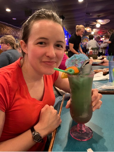 Jen with shark attack drink at Florida restaurant.